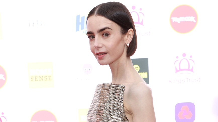 Lily Collins Dazzles in Gold at King's Trust Celebration – A Red Carpet Moment to Remember