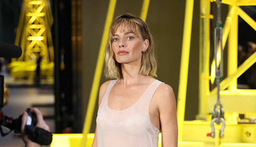 Margot Robbie's Paris Fashion Week Look Leaves Fans Divided